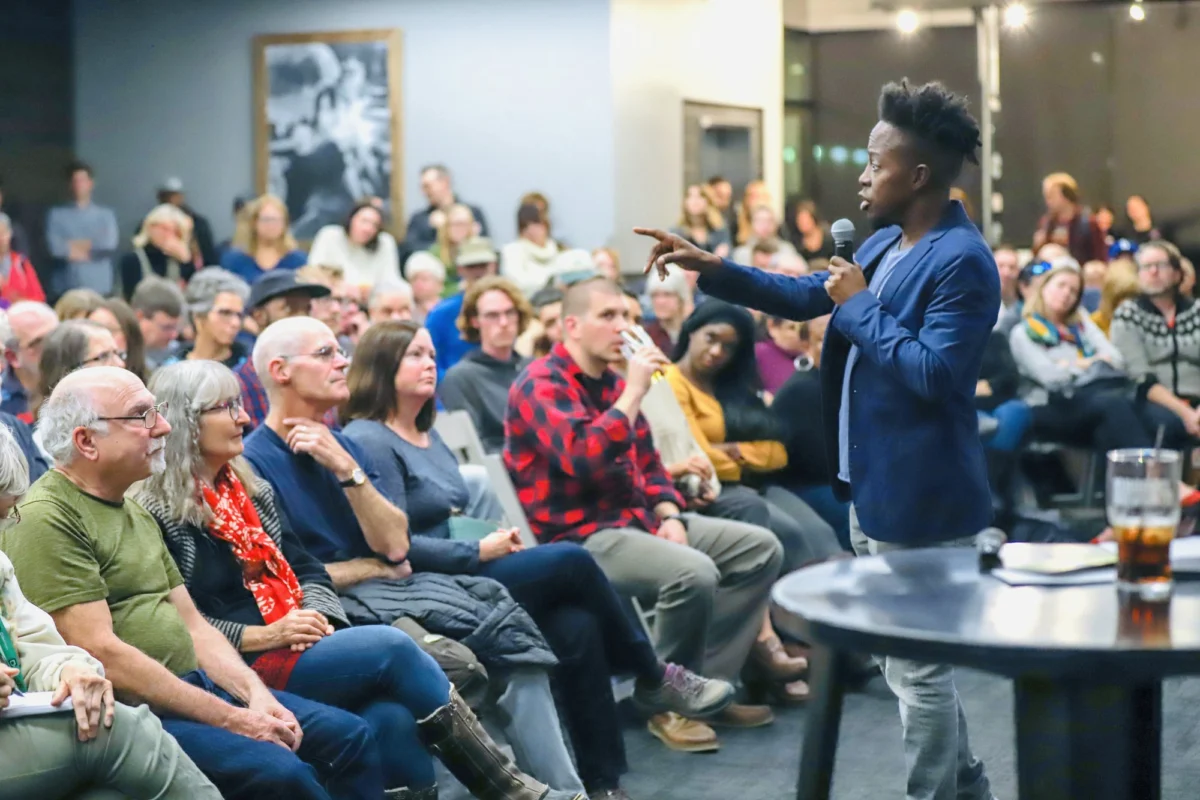 Rich Benjamin speaking with an audience